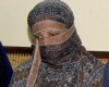 Pakistani Christian woman Asia Bibi listens to Governor of Pakistani Punjab Province Salman Taseer at a prison in Sheikhupura near Lahore, Pakistan (PA)