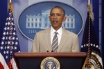 President Barack Obama speaks the economy, Iraq, and Ukraine, Thursday, Aug. 28, 2014, in the James Brady Press Briefing Room of the White House in Washington, before convening a meeting with his national security team on the militant threat in Syria and Iraq.