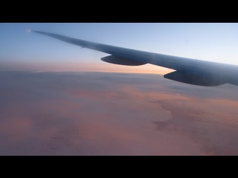 Flying Over The Atlantic Ocean During Sunrise