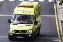 An ambulance transporting a potential ebola virus carrier arrives at the Carlos III hospital in Madrid on October 16, 2014 where 15 people are in quarantine as a precaution following the admission of Spanish nurse Teresa Romero infected with the ebola virus. A person known to have been in contact with the Spanish caregiver infected with Ebola fever as today admitted to hospital for tests, authorities said.  AFP PHOTO / PIERRE-PHILIPPE MARCOU