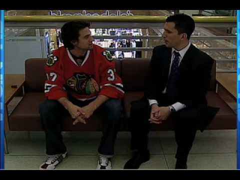 Pat Tomasulo Gets Agitated by Blackhawks Adam Burish