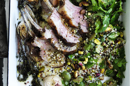 Lamb rack with quinoa salad and tahini sauce.