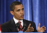 President-elect Barack Obama gestures as he answers questions during his news conference introducing members of his economic team, Monday, Nov. 24, 2008, in Chicago.