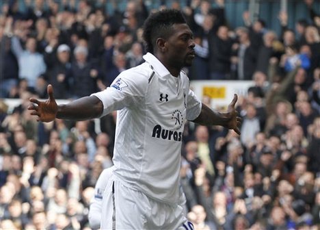 Tottenham Hotspur's Emmanuel Adebayor celebrates his goal against Everton during their English Premier League soccer match at White Hart Lane, London, Sunday, April 7, 2013.