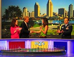 Pat Sajak congratulates Navy wife on Wheel of Fortune.