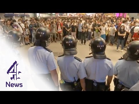 Protesters clash with police in Mongkok area of Hong Kong | Channel 4 News