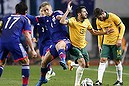 Keisuke Honda (4) of Japan fights for the ball against Aziz Behich (13) of Australia during their international friendly soccer match in Osaka, western Japan November 18, 2014.   REUTERS/Thomas Peter (JAPAN - Tags: SPORT SOCCER)