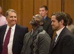 Ricky Jackson, 57, of Cleveland, center,with lawyers Mark Godsey, left, and Brian Howe