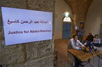 File - Syrian doctor Ahmed Obaid, center right, a colleague of American aid worker Peter Kassig, who converted to Islam while in captivity and changed his name to Abdul-Rahman Kassig, speaks during a press conference in the northern port city of Tripoli, Lebanon, Saturday, Nov. 8, 2014.