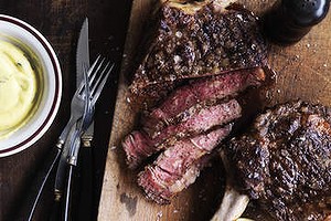 Grilled aged rib-eye with Bearnaise sauce.