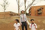 The principal Peter Ezzy of Plumpton High with students Christy Velasco who is in year 10 and her brother
Joma who is in year 8.