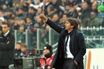 Juventus coach Antonio Conte gestures during a Serie A soccer match between Juventus and Palermo at the Juventus Stadium in Turin, Italy, Sunday, Nov. 20, 2011.