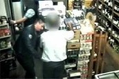 CCTV: Thief hypnotises London shopkeeper (Thumbnail)