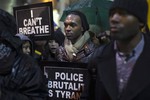 Protesters rally against a grand jury's decision not to indict the police officer involved in the death of Eric Garner, Friday, Dec. 5, 2014, in New York.