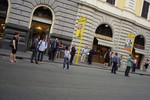 People waiting for the bus, public transportation, Rome Italy