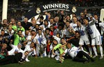 Real Madrid team pose win the Champion League trophy