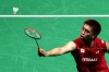 Badminton backhander: Kenichi Tago of Japan in action against Hans-Kristian Vittinghus of Denmark during the Men's Singles matches on day three of the BWF World Superseries Finals at the Hamdan Sports Complex in the United Arab Emirates.  