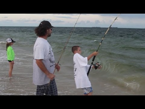 Awesome Beach Fishing - Kid Catches Big Fish During Happy Bait Mullet Run