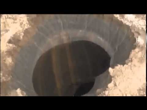 2014 - Russia - Mystery Surrounds 100-Metre-Wide Hole at Russia's 'World's End' - 17/7/14