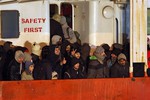 The Moldovan-flagged Blue Sky M carrying hundreds of migrants arrives at the southern Italian port of Gallipoli, some 170 kilometers (108 miles) south of Bari, Italy, Wednesday, Dec. 31, 2014.