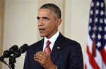 President Barack Obama addresses the nation from the Cross Hall in the White House in Washington, Wednesday, Sept. 10, 2014. In a major reversal, Obama ordered the United States into a broad military campaign to degrade and ultimately destroy militants in two volatile Middle East nations, authorizing airstrikes inside Syria for the first time, as well as an expansion of strikes in Iraq.