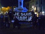 Citizens gather to pay tribute to victims of the terrorist attack against the French satirical weekly Charlie Hebdo, Friday, Jan. 9, 2015, Pezenas, France.