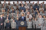 File - US Forces Korea Service Members stand tall behind their Commander-in-Chief, President Barack Obama, during his speech at US Army Garrison Yongsan, South Korea April 26, 2014.