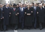 From the left, Israeli Prime Minister Benjamin Netanyahu, Malian President Ibrahim Boubacar Keita, French President Francois Hollande, German Chancellor Angela Merkel, EU president Donald Tusk and Palestinian Authority President Mahmoud Abbas march during a rally in Paris, France, Sunday, Jan. 11, 2015. A rally of defiance and sorrow, protected by an unparalleled level of se