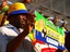 A Gabonese fan shows off his support for his team with a placard during the African Nations Cup in Gabon. 23rd January, 2012.