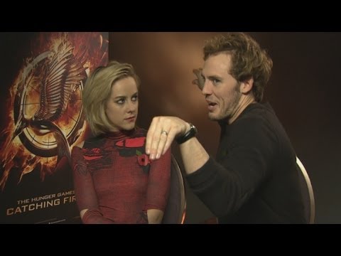 Hunger Games' Sam Claflin and Jena Malone on crabs and the Catching Fire crew