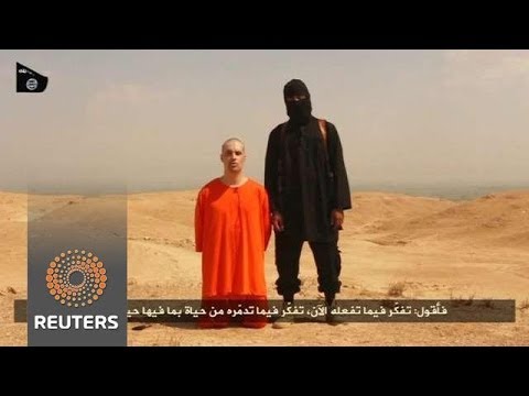 Islamic State says beheads U.S. journalist, holds another