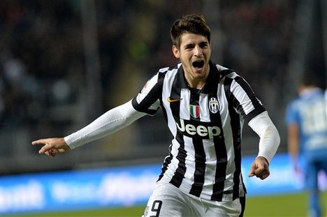 Juventus forward Alvaro Morata celebrates after scoring during a Serie A soccer match between Empoli and Juventus at the Carlo Castellani stadium, in Empoli, Italy, Saturday, Nov. 1, 2014.