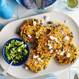 Corn & black bean fritters with green salsa & feta