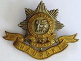 NZ Army Hauraki Regt. Gilt &amp; Silver Cap Badge