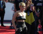 Miley Cyrus arrives at the MTV Video Music Awards at The Forum on Sunday, Aug. 24, 2014, in Inglewood, Calif.