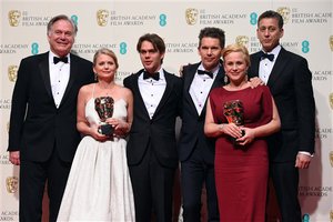 Cast and crew members ( John Sloss , Ellar Coltrane ,  Ethan Hawke , Patricia Arquette , Jonathan Sehring ,  Cathleen Sutherland )  from the winner of the Best Film Award, Boyhood, pose for photographers