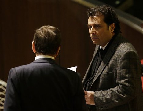 Francesco Schettino attends his trial at the Grosseto court, Italy, Wednesday, Feb. 11, 2015.