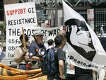 File - Protesters gather outside the Canadian Consulate Wednesday, July 9,2008, in downtown Chicago.