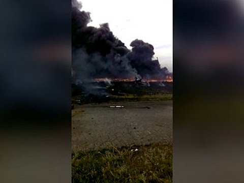 Raw: Video Captures MH17 Crash Aftermath