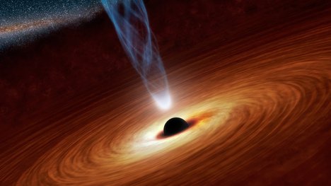 This artist's concept illustrates a supermassive black hole with millions to billions times the mass of our sun. Also shown is an outflowing jet of energetic particles, believed to be powered by the black hole's spin.