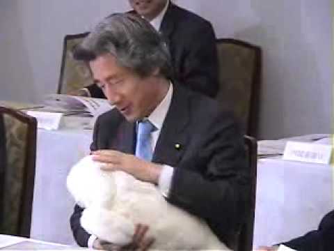 Japanese PM Junichiro Koizumi with Paro,Mental Commitment Robot