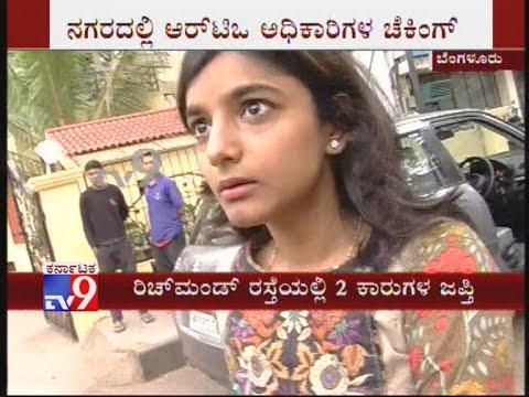 TV9 News: Young Woman Tries To Mow Down RTO Officials in Bangalore