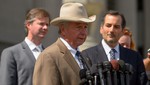 Robert A. Durst's attorneys, including Dick DeGuerin, center, and William P. Gibbens, left, speak briefly after leaving Orleans Parish Criminal District Court in New Orleans, La. Monday, March 16, 2015.