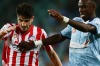 SYDNEY, AUSTRALIA - MARCH 20:  Bernie Ibini-Isei of Sydney FC competes for the ball against Paulo Retre of Melbourne City during the round 22 A-League match between Sydney FC and Melbourne City FC at Allianz Stadium on March 20, 2015 in Sydney, Australia.  (Photo by Matt King/Getty Images)