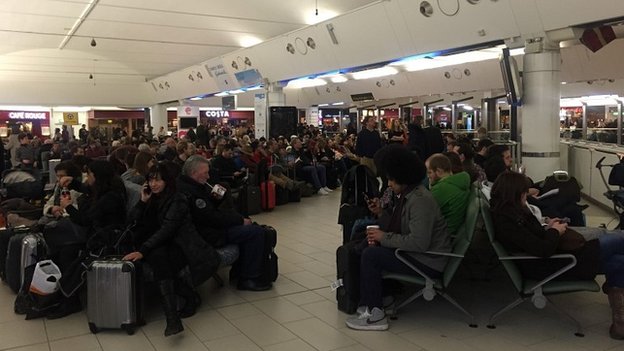 Passengers waiting at Gatwick airport