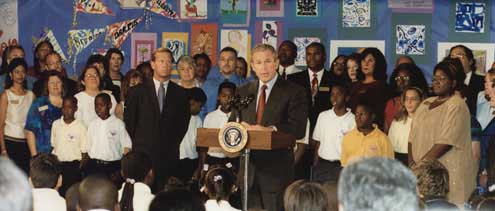 President Bush begins speaking at 9:30 a.m. in the library of Booker Elementary School. 
