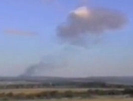 Smoke rising, minutes after Flight 93 crashes in Pennsylvania.