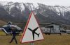 Rescue helicopters from the French Gendarmerie and the Air Force are seen in front of the French Alps during a rescue operation next to the crash site of an Airbus A320, near Seyne-les-Alpes, March 24, 2015. An Airbus plane operated by Lufthansa's Germanwings budget airline, en route from Barcelona to Duesseldorf, crashed in a remote snowy area of the French Alps on Tuesday and all 150 on board were feared dead.    REUTERS/Jean-Paul Pelissier