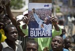 Supporters of opposition candidate Gen. Muhammadu Buhari's All Progressives Congress (APC) party celebrate what they said was the senatorial win in Kano Central district of APC candidate Rabiu Musa Kwankwaso, in Kano