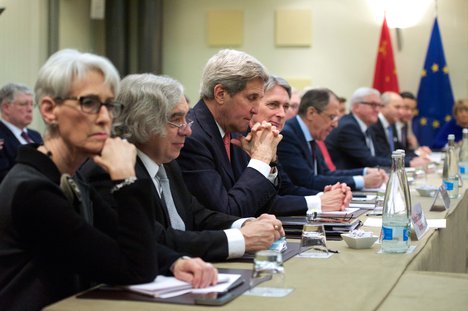 U.S. Secretary of State John Kerry sits with his counterparts from Germany, China, the European Union, France, the United Kingdom, and Russia on March 30, 2015, in Lausanne, Switzerland, before the P5+1 partner nations resume direct negotiations with Iranian officials about the future of their country's nuclear program.